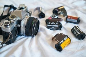 Camera with film canisters